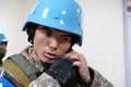 Almaty / Kazakhstan - 11.20.2020 : A soldier in a peacekeeper`s outfit in the room during the exercise