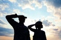 Soldiers in uniform saluting. Military service