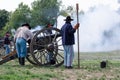 Soldiers using a cannon