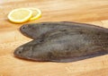 Sole Fish, solea solea, Fresh Fish with Lemon Royalty Free Stock Photo