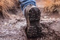 Sole of an Hiking shoe covered in mud