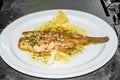 Sole meuniere with parsley and lemon. Royalty Free Stock Photo