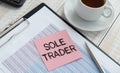 SOLE TRADER, text on white notepad on craft background Royalty Free Stock Photo