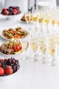 Solemn happy new year banquet. Lot of glasses champagne or wine on the table in restaurant. buffet table with lots of Royalty Free Stock Photo