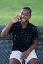 Black Teen Boy Talking on his cell phone Royalty Free Stock Photo