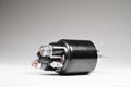 Solenoid for Starter for a car on gray background. Car spare parts. Spare parts for the starter