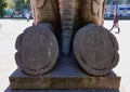 Soles of feet a kneeling elephant made of stone at the entrance of the zoo of Berlin