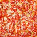 Solid background with freshly baked homemade pizza with tomatoes, cheese, sausage.Simple summer food