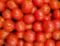 A solid background of ripe tomatoes without leaves