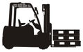 Solid black forklift and pallets Royalty Free Stock Photo
