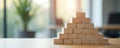 Solid blocks built strong foundation, pyramid, business infrastructure, leadership, success. Creative arrangement of wooden blocks Royalty Free Stock Photo