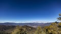 Solid blue sky on a mountain range landscape Royalty Free Stock Photo