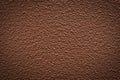 Solid brown painted wall background.