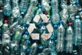 Solid carpet of plastic bottles with a white recycling symbol