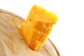 Solid gauda cheese on wood Royalty Free Stock Photo