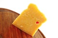 Solid gauda cheese on wood Royalty Free Stock Photo