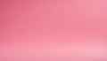 Solid medium pink studio background with a soft, diffused light creating a subtle shadow at the bottom Keywords Royalty Free Stock Photo