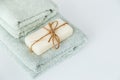 Solid soap corded on bath towels on white background with copy space. Royalty Free Stock Photo