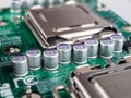 Solid-state capacitors on the motherboard of a desktop personal computer, server computer, electric batteries, computer repair, se Royalty Free Stock Photo