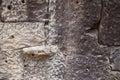 Solid stone wall. Grey stone closeup. Weathered grungy brick wall photo background. Distressed texture of natural rock. Royalty Free Stock Photo