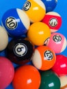 Solid and stripes pool balls on a blue background. Royalty Free Stock Photo