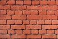 solid wall of red brick laid horizontally Royalty Free Stock Photo