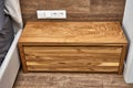 Solid wood nightstand in the interior. Solid elm nightstand. Details furniture