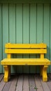 Solid yellow painted bench, weathered wood grain, day, vintage, fall Royalty Free Stock Photo