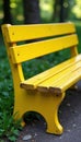 Solid yellow painted bench, weathered wood grain, furniture, yellow Royalty Free Stock Photo
