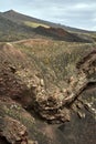 Solidified lava and old craters on the slope of the active volcano Etna Royalty Free Stock Photo