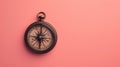 A solitary antique compass, isolated against a clean smooth single color backdrop