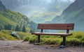 Solitary Bench Overlooking Misty Mountain Landscape