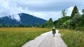 Solitary Blonde Female Walking a lonely path in the Bavarian Countryside