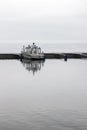 Solitary boat in a harbor Royalty Free Stock Photo