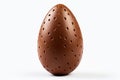 Single chocolate egg with dotted pattern isolated on a white background Royalty Free Stock Photo