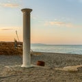 A solitary column standing by the beach