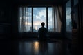 Solitary contemplation a man silhouette gazes at closed bedroom window Royalty Free Stock Photo