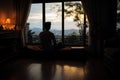 Solitary contemplation a man silhouette gazes at closed bedroom window Royalty Free Stock Photo