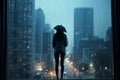 Solitary figure in urban rain