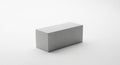 A single gray concrete building block on a white background brick construction Royalty Free Stock Photo