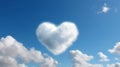 A Solitary Heart-Shaped Cloud Adorn the Azure expanse of a Blue Sky, Isolated emblem of Love in the Natural Landscape Royalty Free Stock Photo