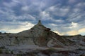 Dinosaur Provincial Park, Solitary Hoodoo with Prairie Thunderstorm brewing Overhead, Alberta, Canada Royalty Free Stock Photo