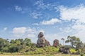 Solitary stones inserted in the African vegetation on the way to northern Angola. Soyo. Africa