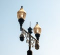 Solitary street light illuminating the night with its soft glow, casting a warm and inviting light