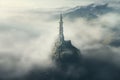 Isolated tower reaching into the misty and