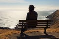 Solitude scene girl in black, hat, cliff bench, sea