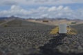 Solo blank white coffee mug on a empty landscape highway. Royalty Free Stock Photo