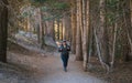 A solo female hiker in the forest