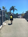 Solo female traveler walking on the streets of Sydney, Australia and enjoying her vacation