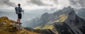 Solo hiker admiring the view on top of a mountain. French Alps view of the Col des Aravis - tourism and vacation - Pointe de